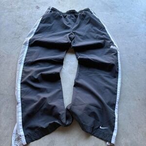 Vintage Y2K Nike track pants, side stripes and pocket super high quality‎